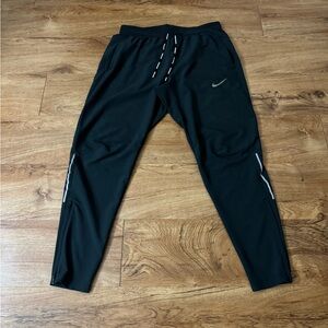 Nike tech pants size medium